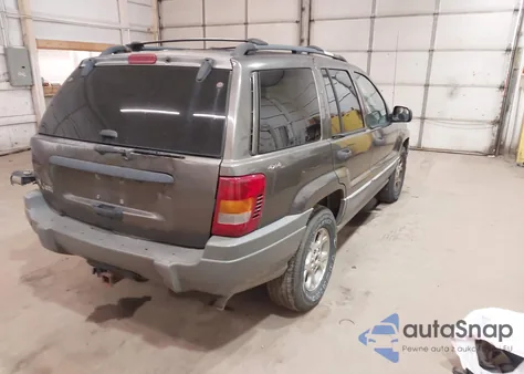 2000 Jeep Grand Cherokee Laredo from USA, damaged, VIN 1J4GW48S1YC277710
